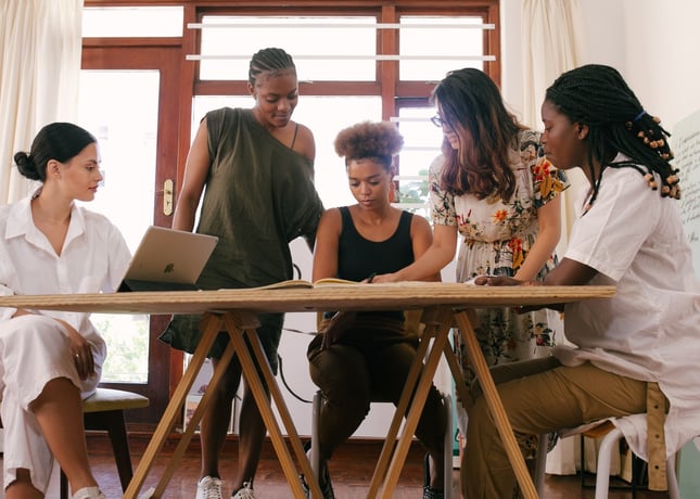 Group of women around a table